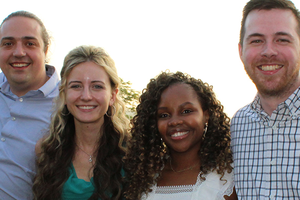 Posed photo of smiling graduates of the Family Medicine Residency