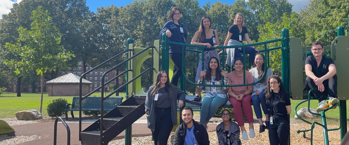 group photo of internal medicine residents at a park