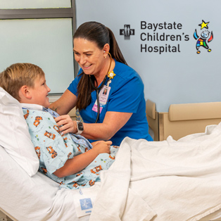 nurse taking care of child in the Baystate Children's Hospital